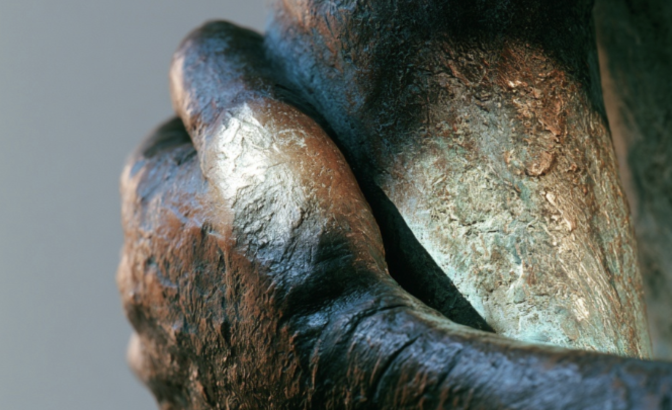 Light falling across a sculpted stone surface.